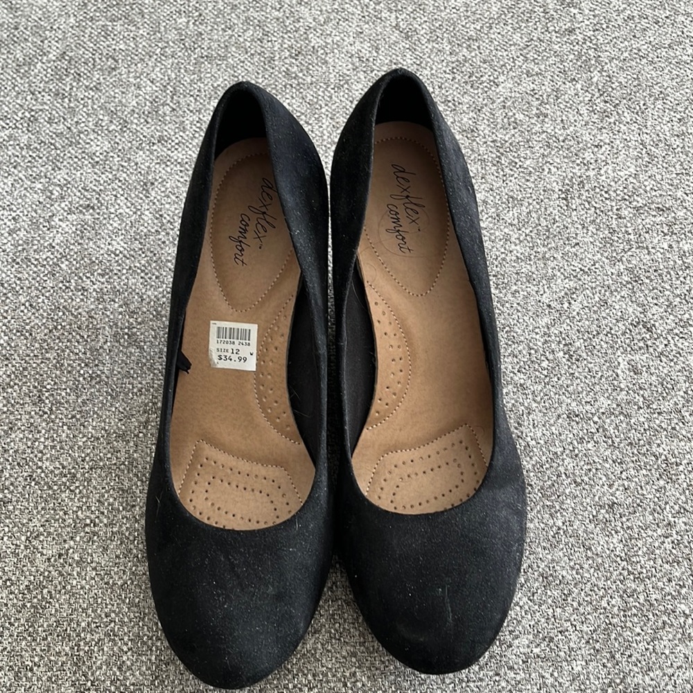 Black velvet like wedges. They are size 12